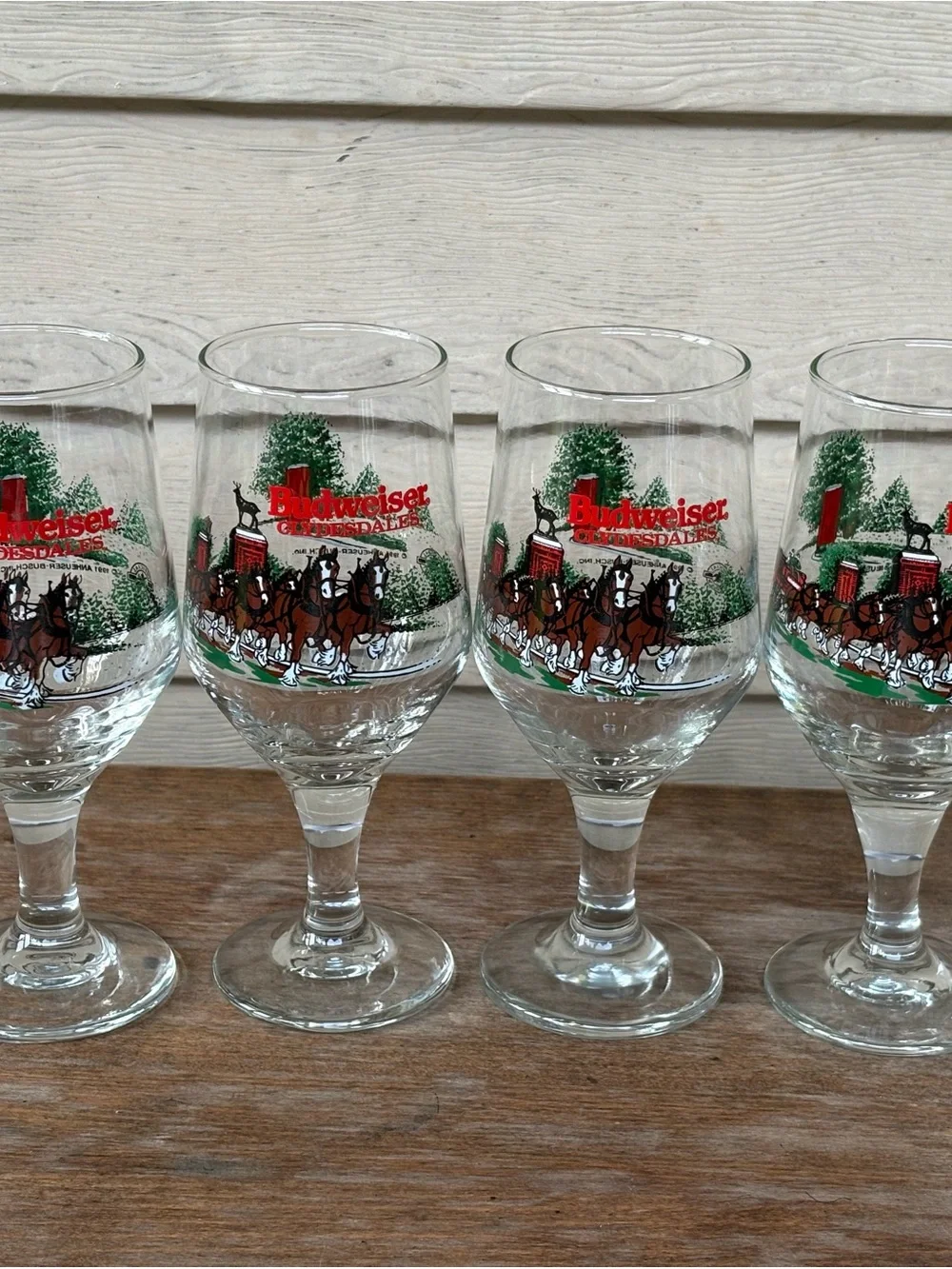 4 VTG 1991 Budweiser Clydesdales stemmed beer glasses featuring a winter scene